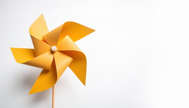 pinwheel or windmill paper origami isolated on white background simple starter craft for kids for weekend entertainment. ESG and Clean Energy Concept. Wind Turbine Paper into the Sky. Decrease Carbon