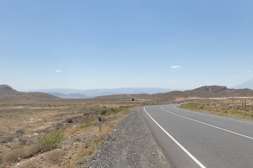 Journey Through Armenian Desert: Majestic Mountains on the Horizon