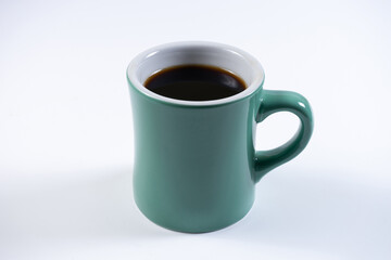 Closeup of ceramic cup with filter coffee or americano drink on white background