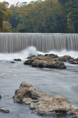 Water flowing between the rocks, beautiful water panorama, waterfall