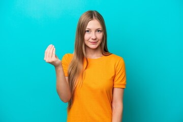 Young Russian woman isolated on blue background making Italian gesture