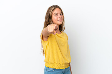 Little caucasian girl isolated on white background pointing front with happy expression