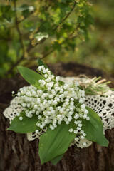 Photo of a bouquet of white lilies of the valley.