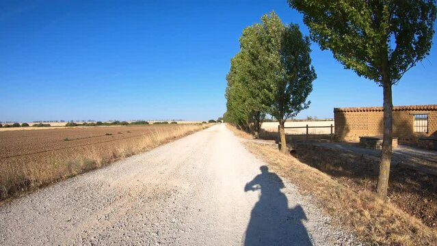 French Way of Saint James - rest area at Canada Real Leonesa gravel road between Carrion de los Condes and Calzadilla de la Cueza, province of Palencia, Castile and Leon, Spain