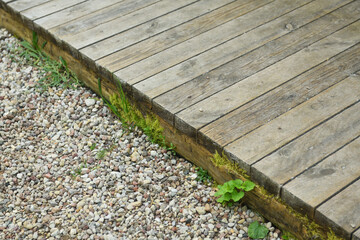 Planks terrace, gravel and garden