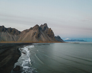 Dramatic view of Vestrahorn mountains and black sand beach at Stokksnes, South East Iceland