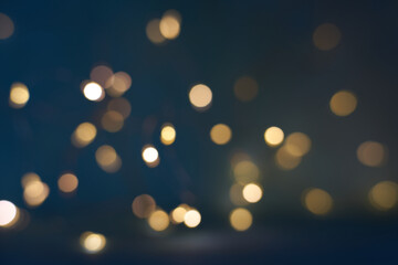 Christmas light background. New Year Holiday glowing backdrop. Defocused Background With Blinking light. Blurred Bokeh.