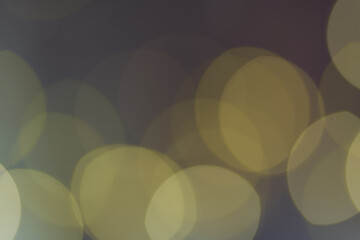 Christmas light background. New Year Holiday glowing backdrop. Defocused Background With Blinking light. Blurred Bokeh.