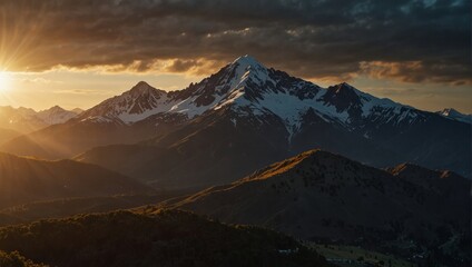 A view of a mountain range with the sun shining on it,.