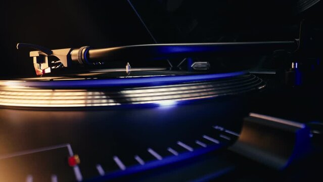 Classic stylus needle traces grooves of vinyl record. Popular player used by DJs