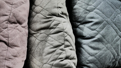 Close-up of beautiful colored quilted pillows