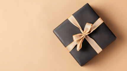 A small luxury gift box on a beige background, perfect for father's day or valentine's day for him. Also suitable for corporate gifts or birthday parties.