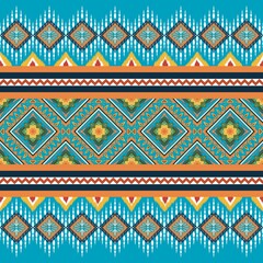 Ethnic geometric pattern on blue background. Illustration. Design for textures, fabric, clothing, wrappings, prints, decorations and carpets. Thai pattern. Green, yellow and blue tones. Aztec style ab