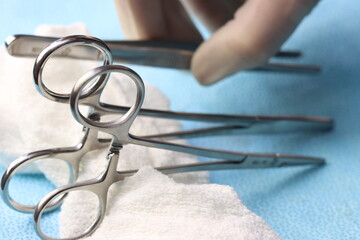 Close up of a surgical instrumentais a surgical surface beeing holding 