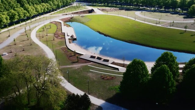New redesigned Victory park in Riga, Latvia with a pond and pedestrian walks.