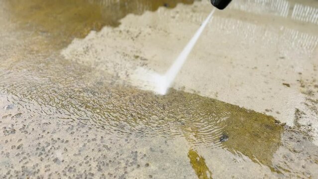 Terrace floor cleaning with a high pressure washer
