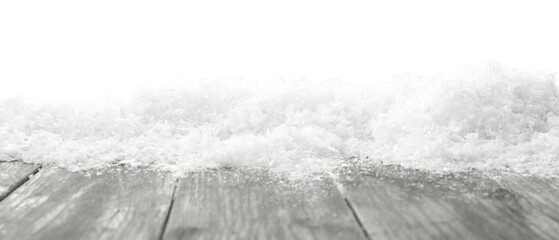 Snow on grey wooden surface against white background. Christmas season