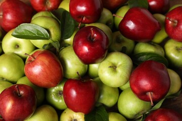 Fresh ripe red and green apples as background, top view