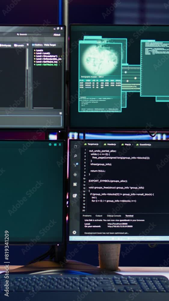 Poster vertical video code running on monitors in empty apartment used by hacker stealing state secrets fro