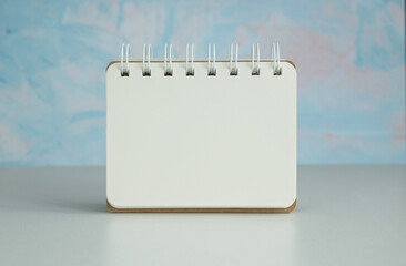 blank notepad sheet mockup. square shape notebook. top view. copy space.