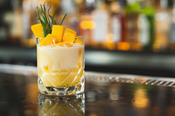 Whiskey Sour cocktail mango. Mango tropical cocktail.