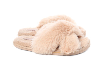 Pair of beige soft slippers isolated on white