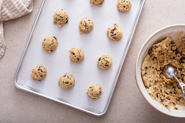 Scoops of cookie dough on baking sheet