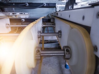 Close up the chain belt rubber for tray conveyor on the candling  machine.