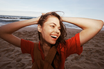 Travel Joy: Woman Backpacker Embracing Nature at Beach, Feeling Free and Relaxed - Wide Angle...