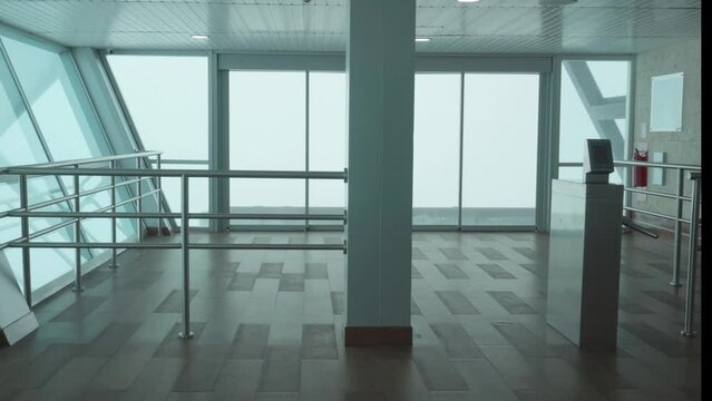 Modern building corridor, cable car with a cloudy view of the outdoors