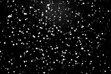 Particles of natural snow. black background. High quality photo