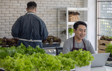 Vegetable Sellers Using Laptop for Inventory Management in Indoor Urban Market