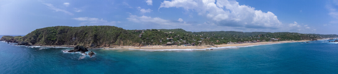 Panoramic coastal view of Mazunte, Oaxaca from the air