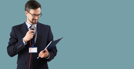 Male journalist with microphone and clipboard on blue background with space for text