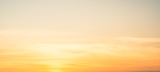 Orange sunset sky with clouds
