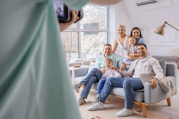 Happy family having photo shoot in studio