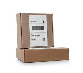 Cardboard packages with shipping label and barcode on white background