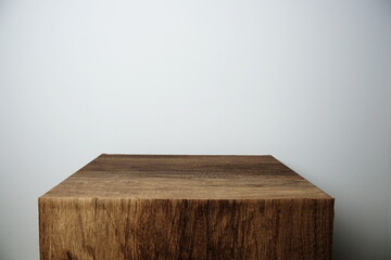 Empty wooden podium stand for display products front of concrete background