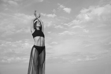 young slender woman in a bikini