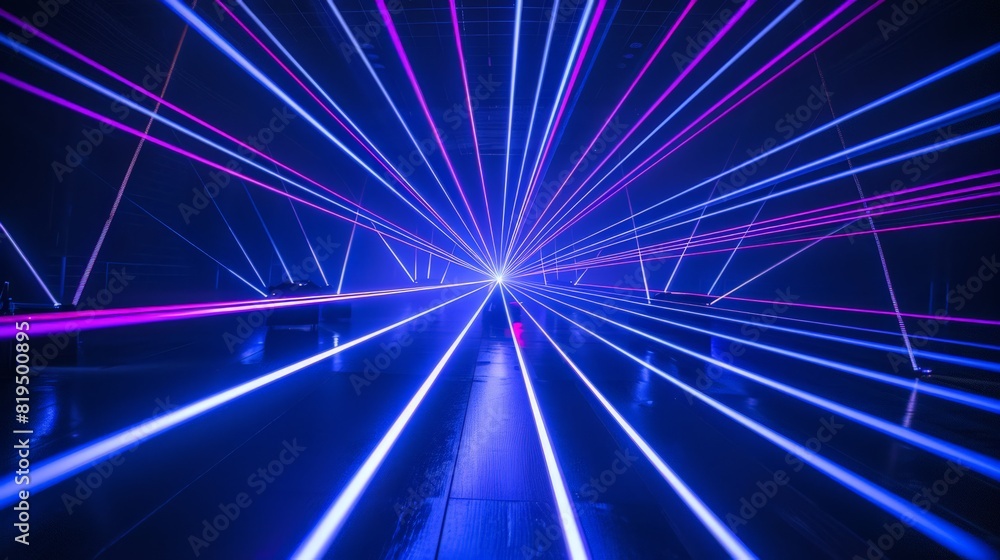 Poster bright beams of blue and violet laser light pierce the black background, creating a mesmerizing disp