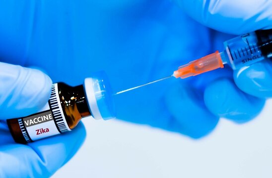 Vaccine bottles and syringes for preventing zika virus.