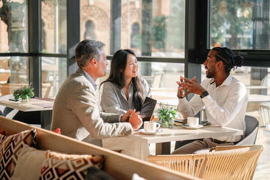 multiethnic group having a business meeting