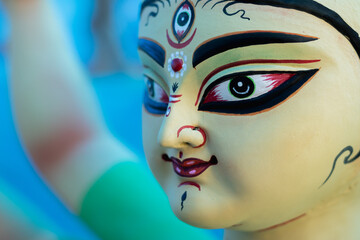 goddess durga idol during durga puja festival. The idol is made of clay.