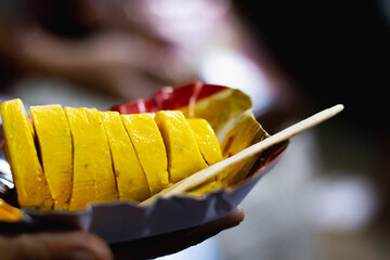 Malai kesar kulfi is an Indian ice cream made of milk, saffron and dry fruits. This frozen dessert is served on a plate for consuming