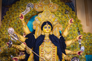 goddess Durga idol during Durga puja festival in India. It is very popular hindu religious...