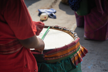Dhak being played by dhaki during durga puja festival. This is a special drum or musical instrument traditional to the hindu festival and bengali culture.