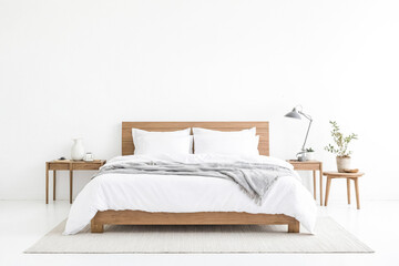 Minimalist Bedroom with Wooden Bed and White Bedding