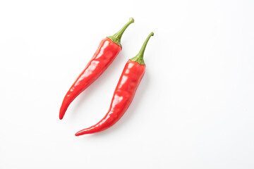 Two Red Chili Peppers Isolated on White Background