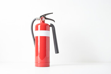 Obraz premium Fire extinguisher on white background