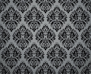 Floral pattern. Vintage wallpaper in the Baroque style. Seamless vector background. Gray and black ornament for fabric, wallpaper, packaging. Ornate Damask flower ornament